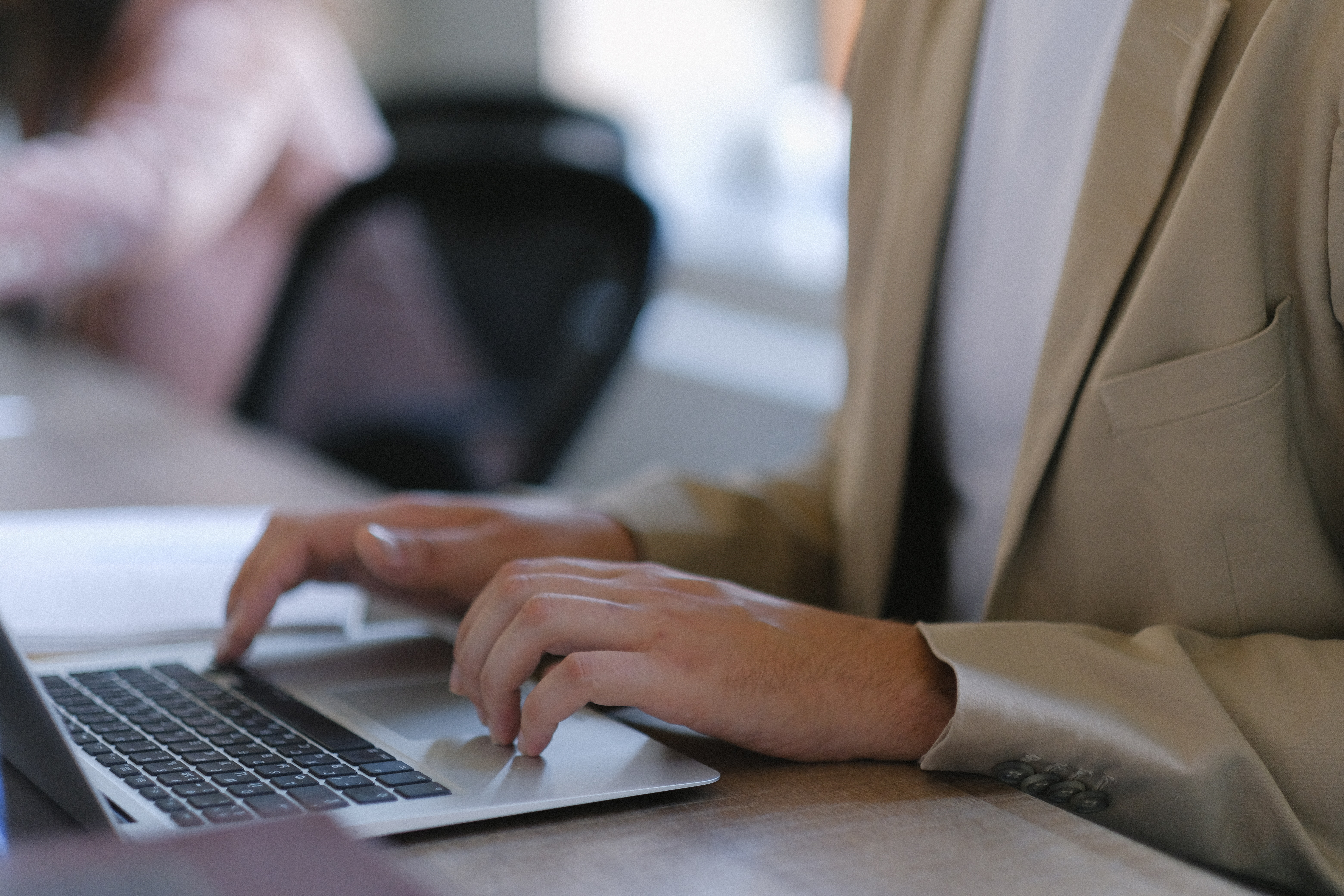 Man working in office on laptop