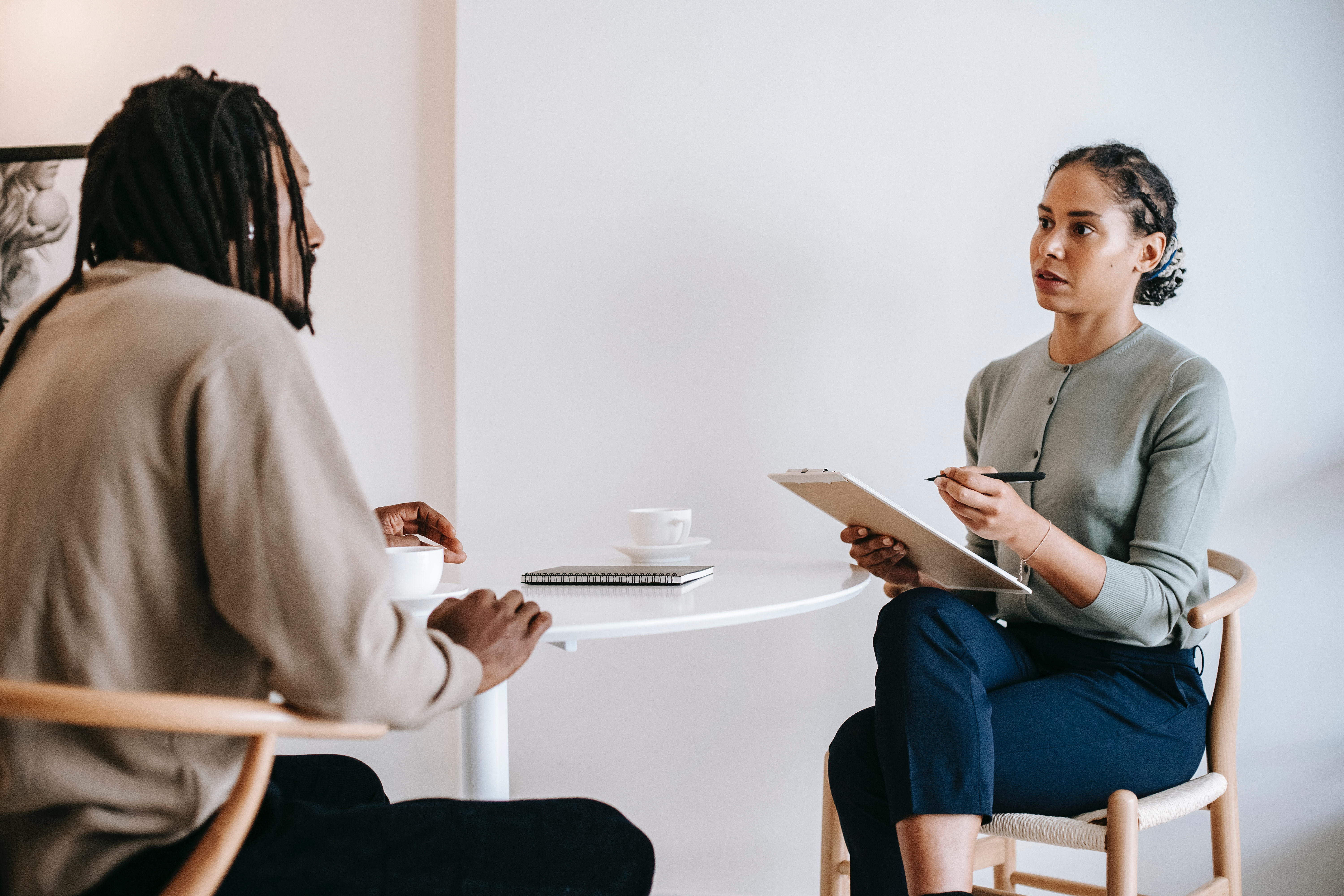 Woman talking to a man in an office